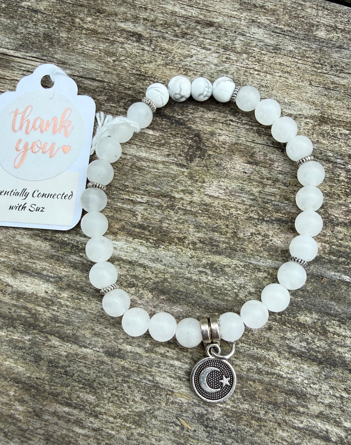 Frosted White Jade & Howlite with a Silver Charm Stretch Bracelet